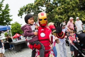 Ironman with a young fan