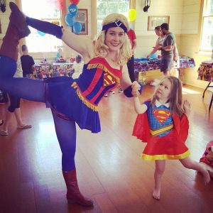 Supergirl poses with Supergirl fan