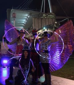 Glow performers Hula hooping & silk wing dancers